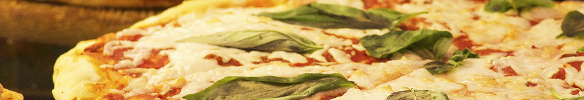 Eating Italian Pizza at Comella's Restaurants Melrose restaurant in Melrose, MA.